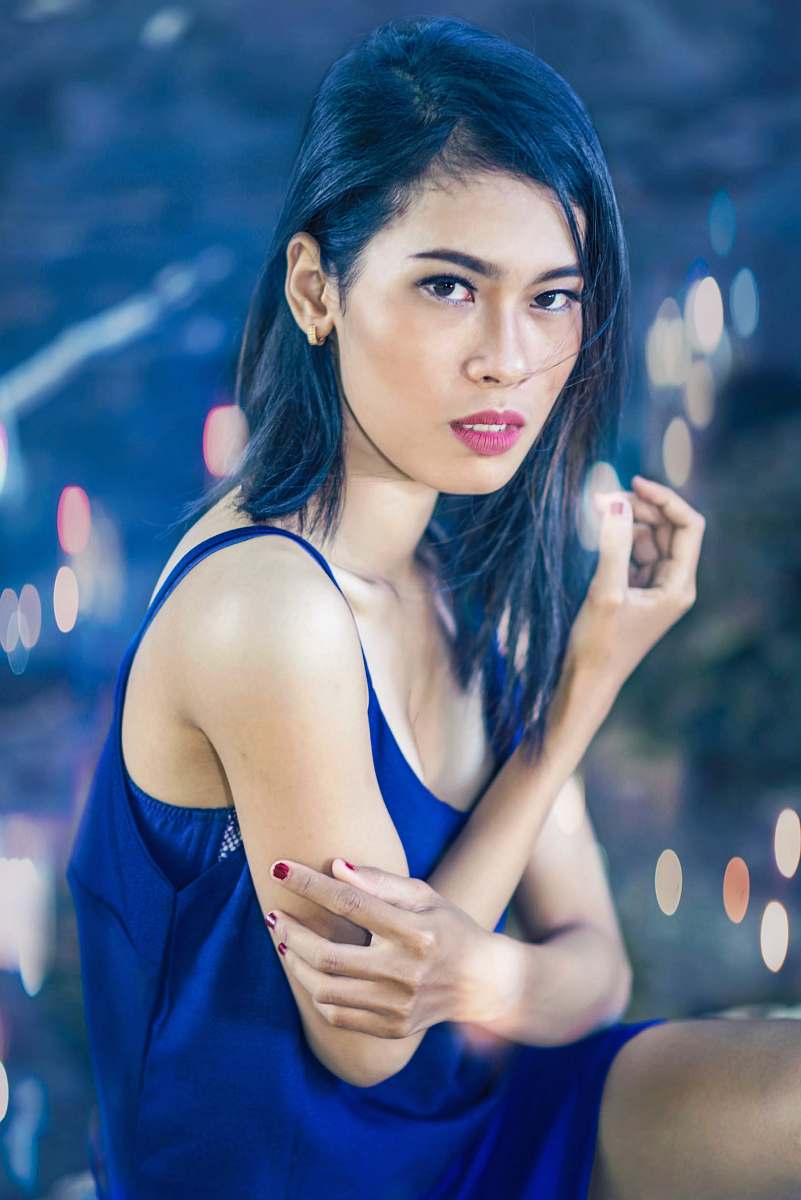 person woman in blue spaghetti strap top bokeh photography people