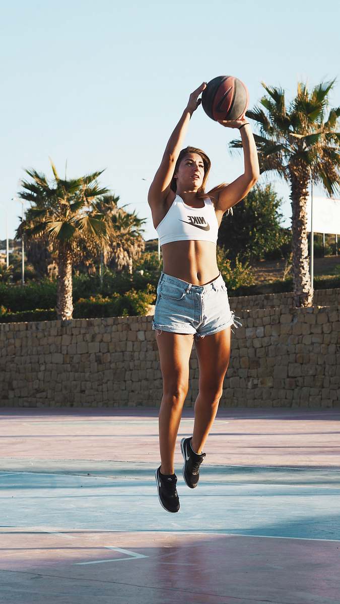 person woman playing basketball people