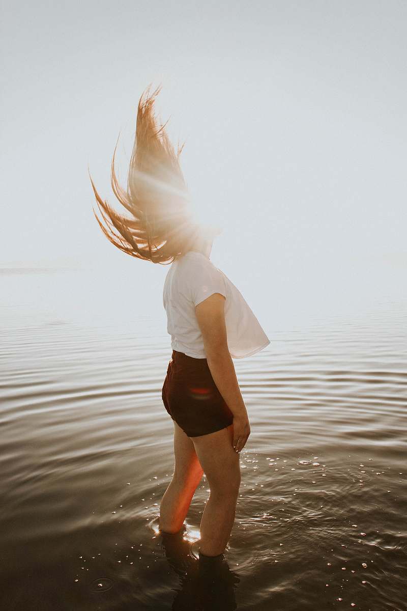 person woman standing in body of water people