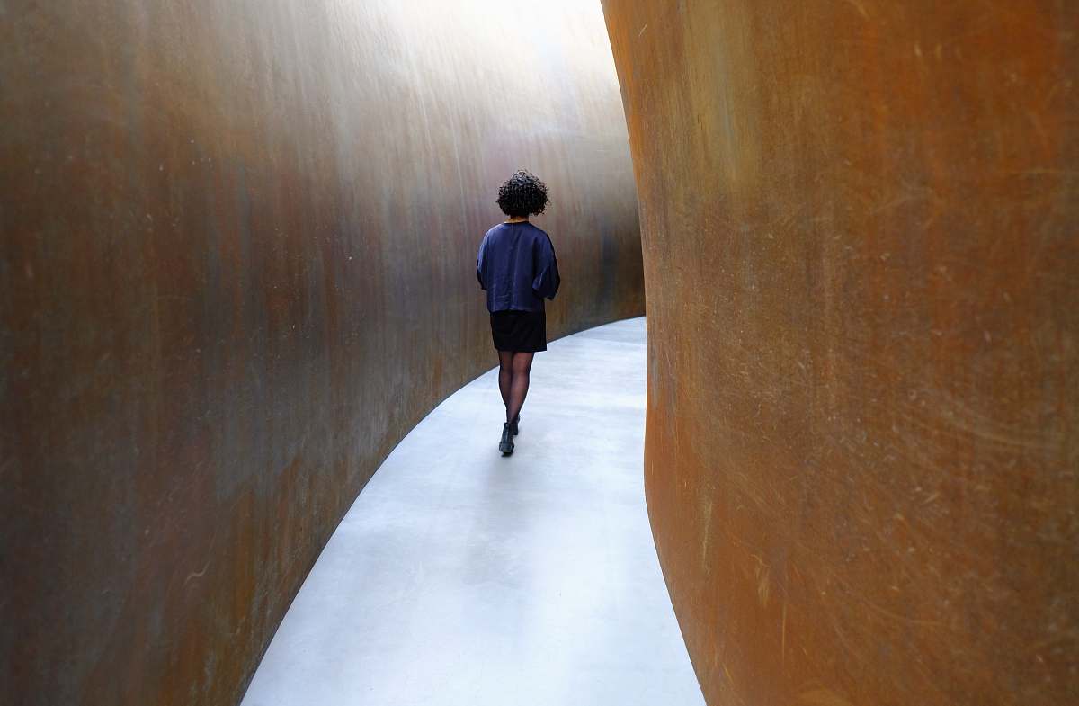 person woman standing on path people