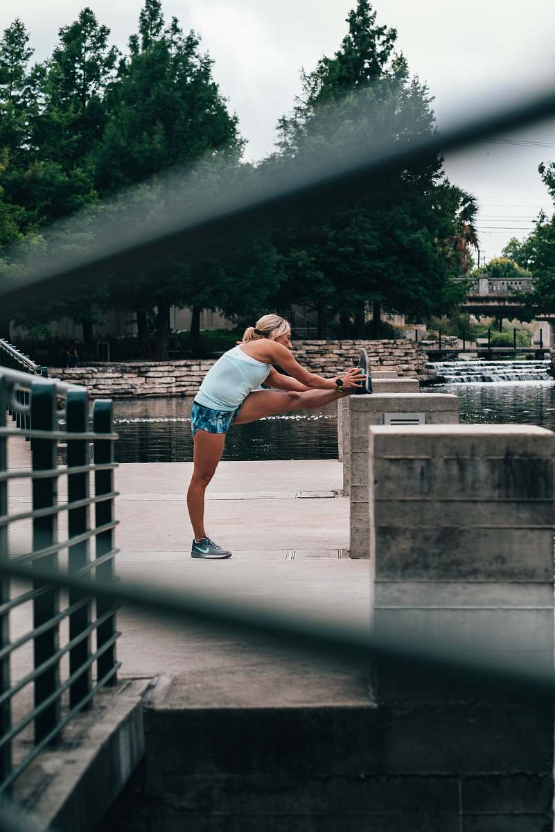people woman stretching during daytime person