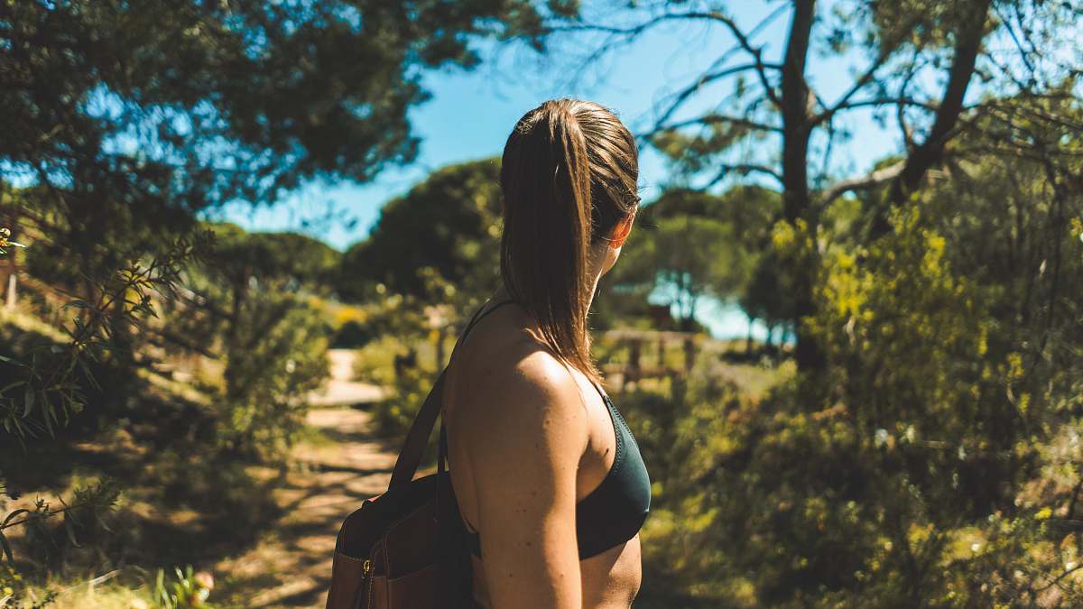 clothing woman surround by trees apparel
