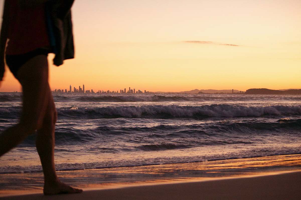 person woman walking on shore outdoors