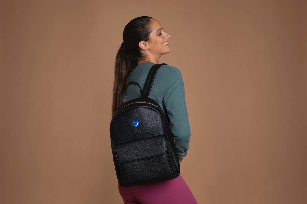backpack woman wearing black backpack bag