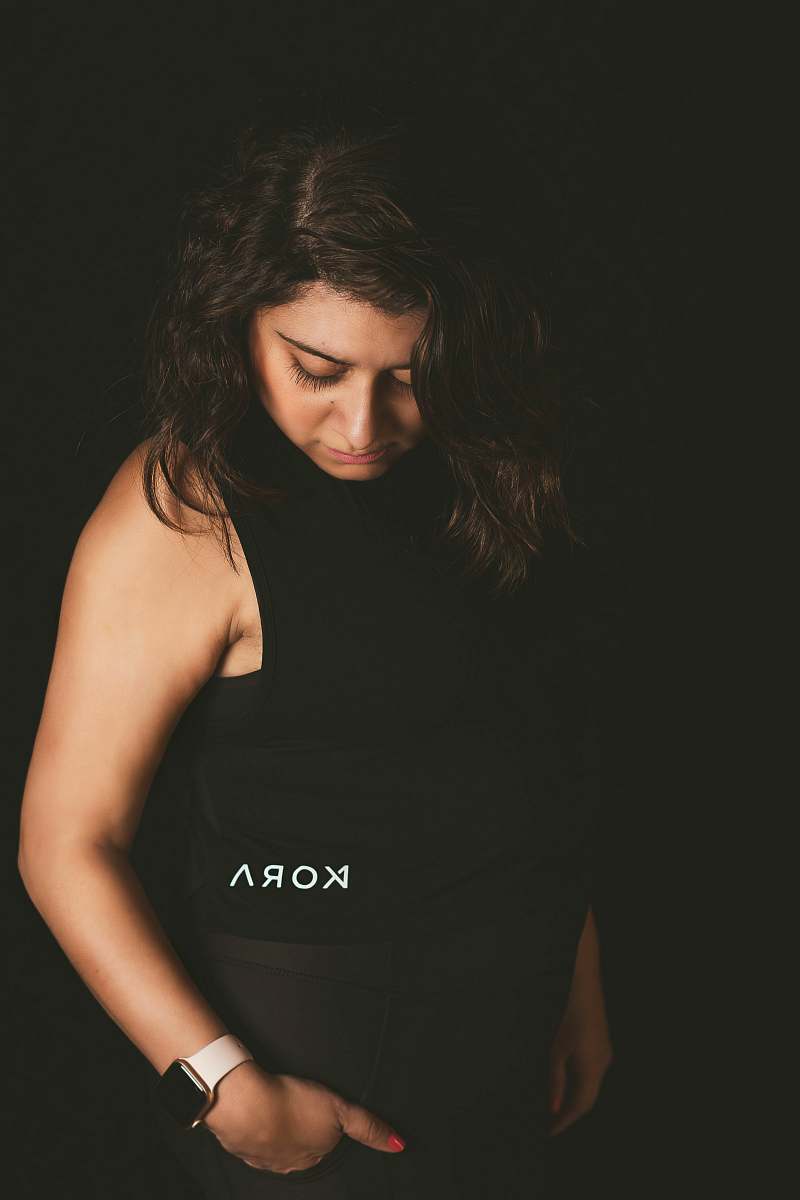 apparel woman wearing black blouse clothing