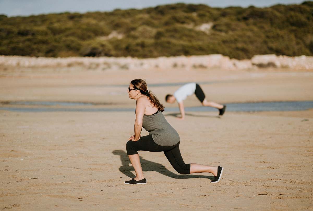 people woman wearing grey tank top doing exercise person