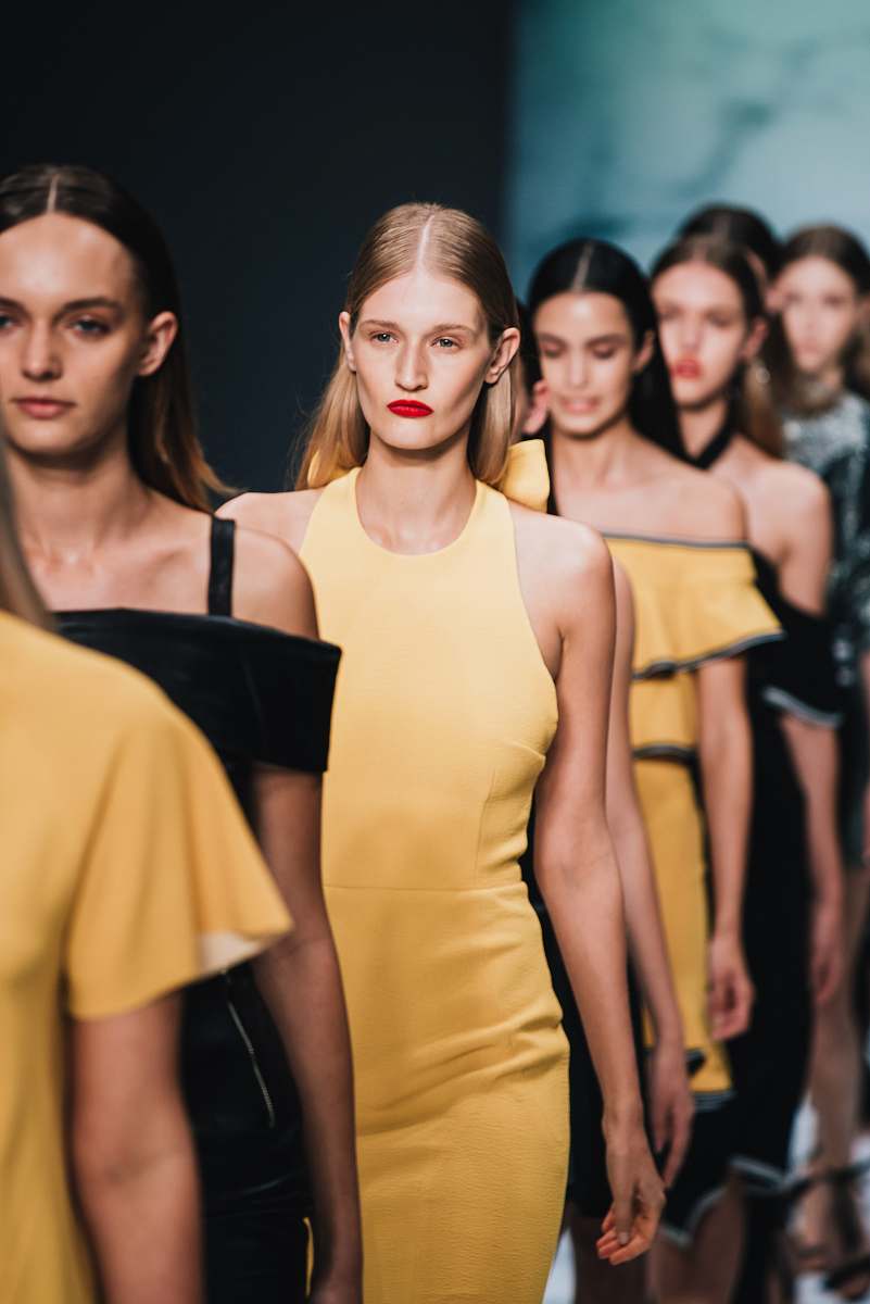 person woman wearing yellow sleeveless dress people