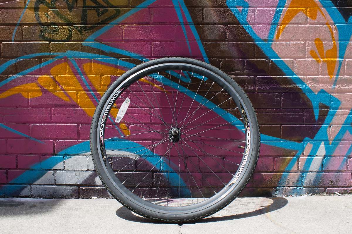 wheel black bicycle tire with rim graffiti
