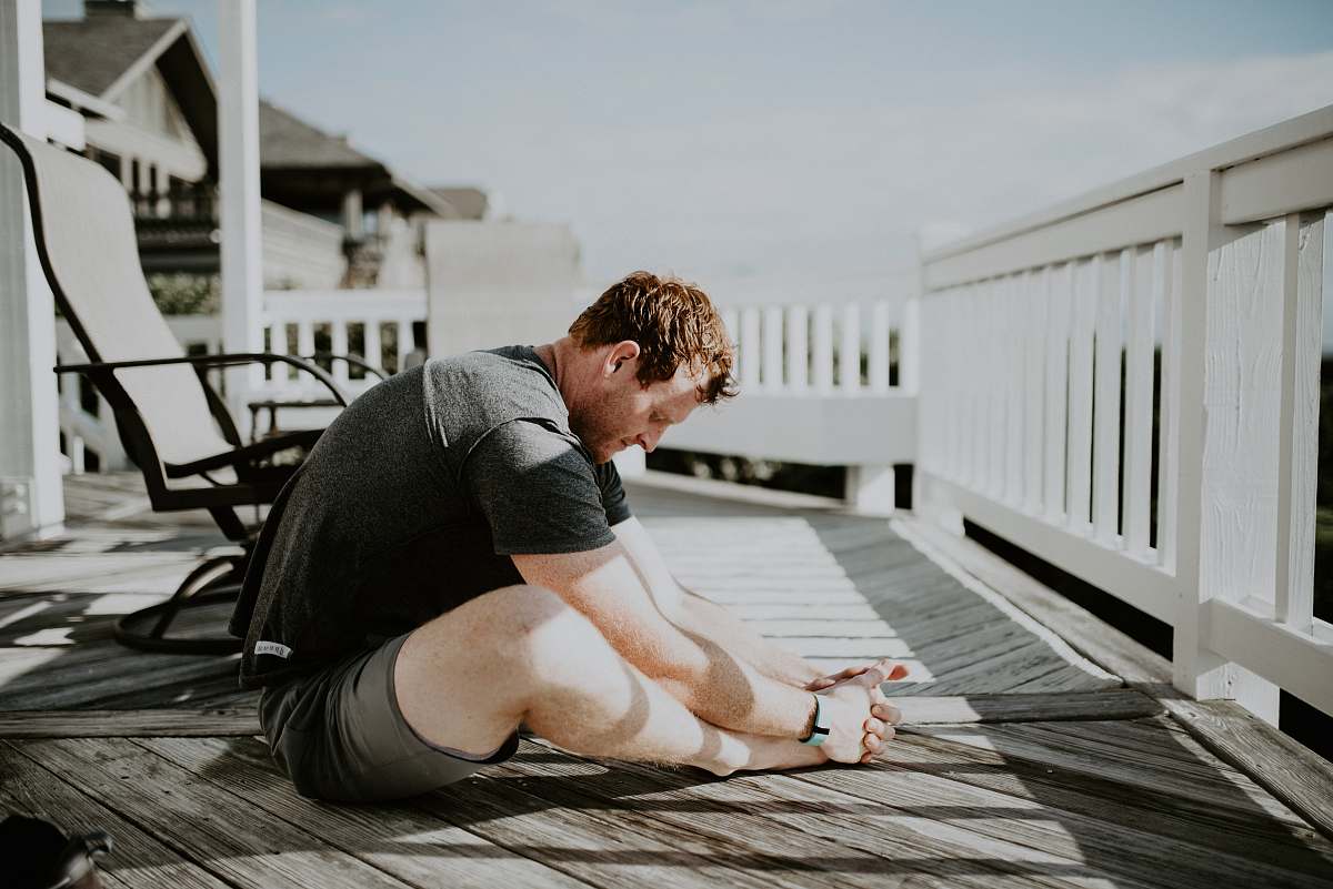 human man doing yoga in porch people