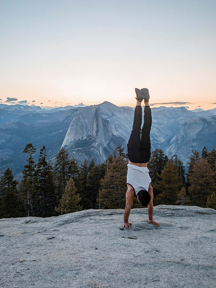 human man hand standing on cliff exercise