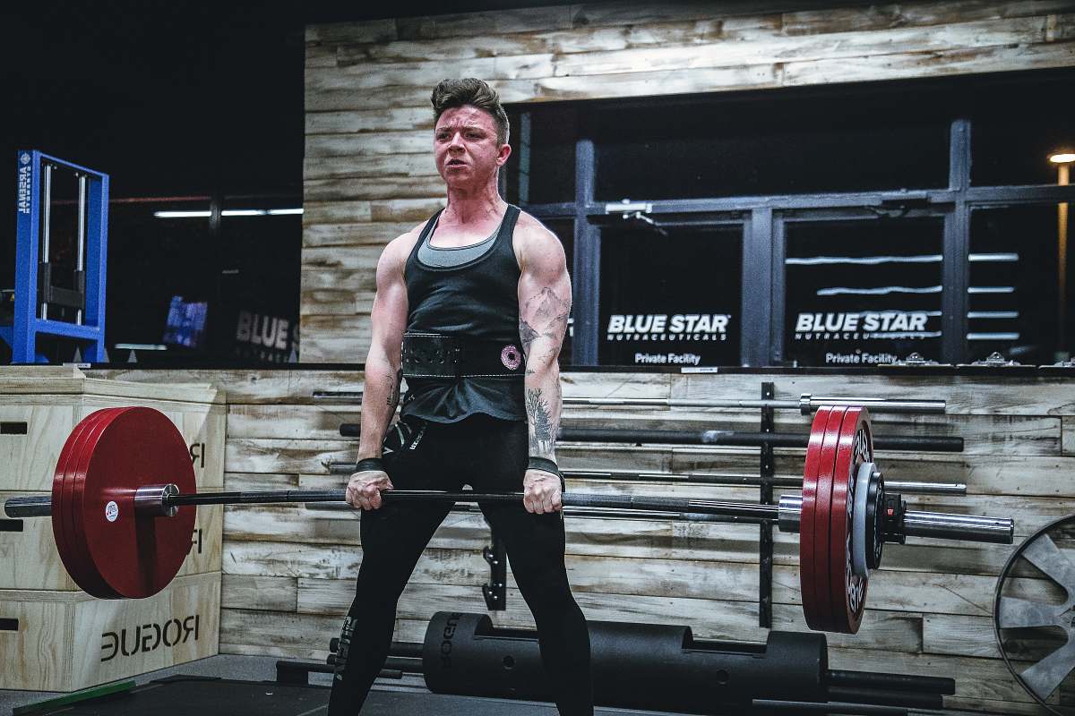 human man lifting barbell apparel