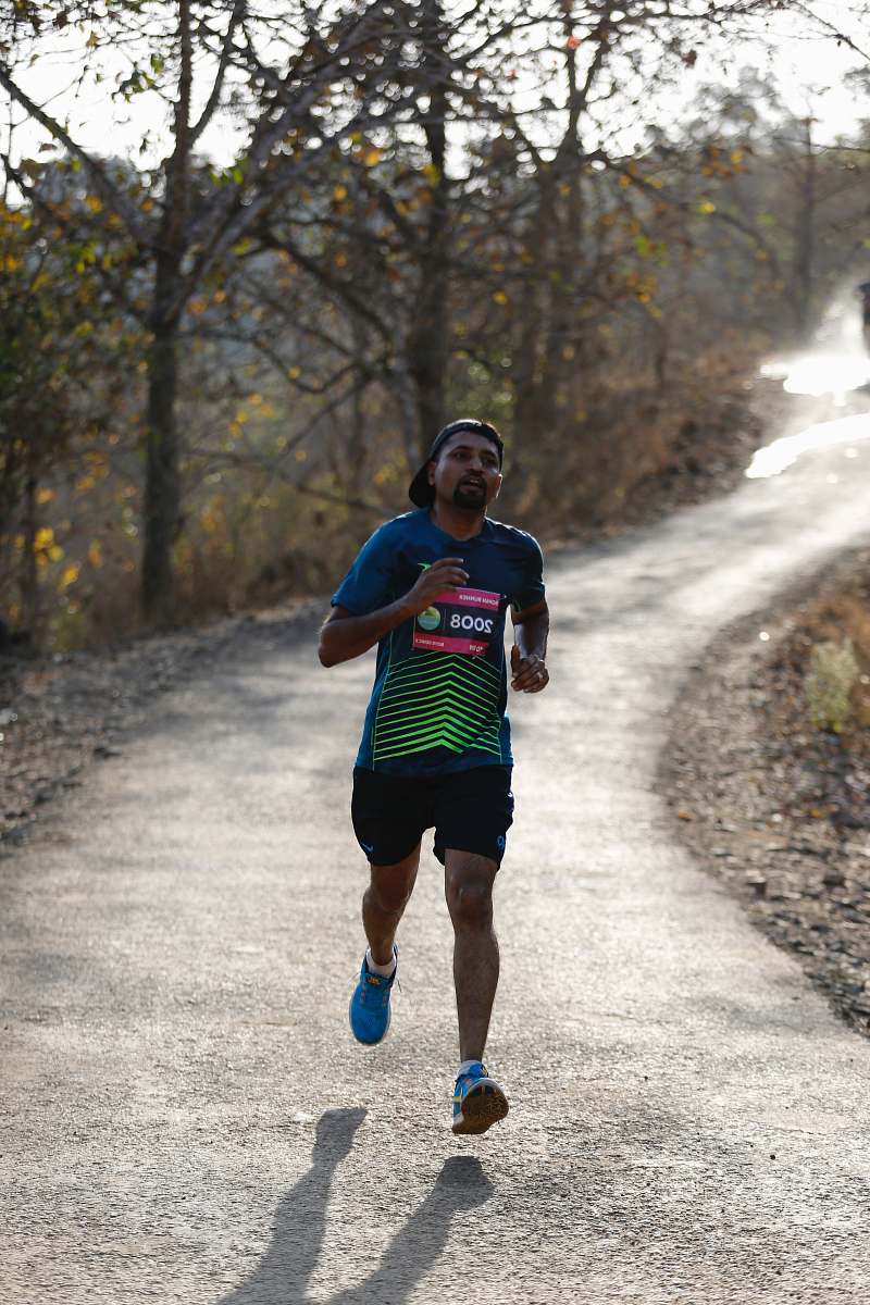human man running during daytime sport