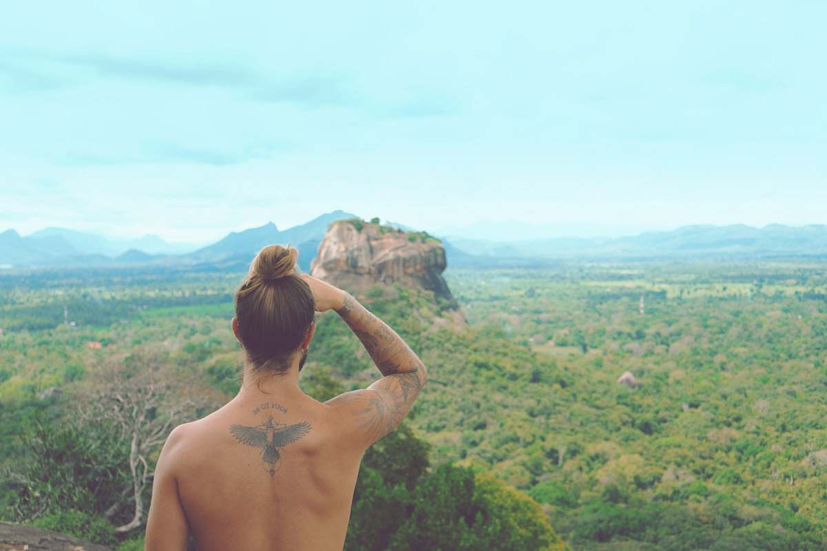human man sight seeing on mountain people