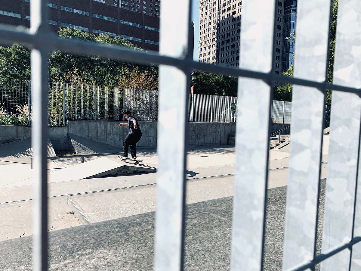 human man skateboarding asphalt