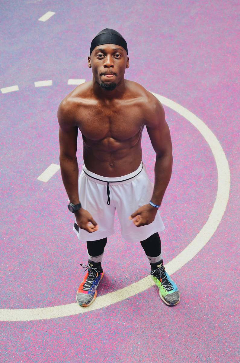 human man standing on purple ground shoe
