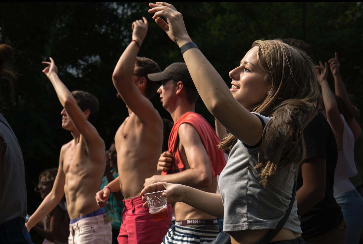 human people gathering raising hands up high people