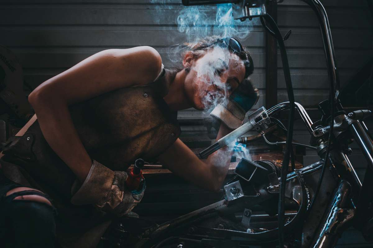 human person blowing smoke people