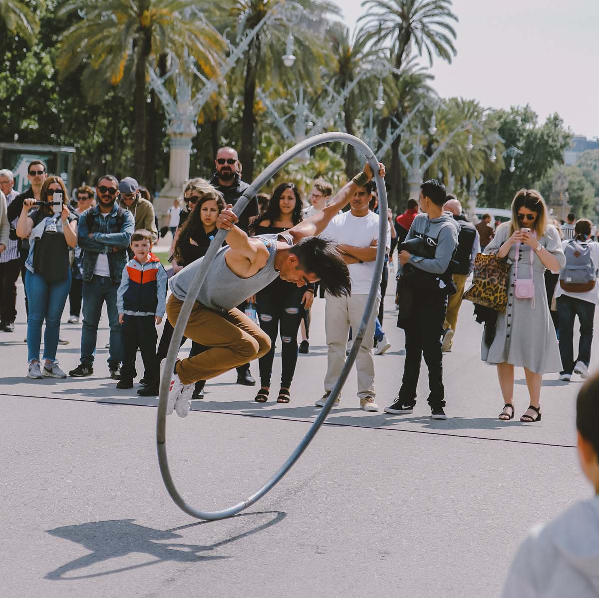 human person performing acrobats crowd