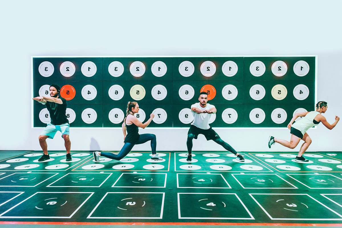 human three men and woman doing exercises people