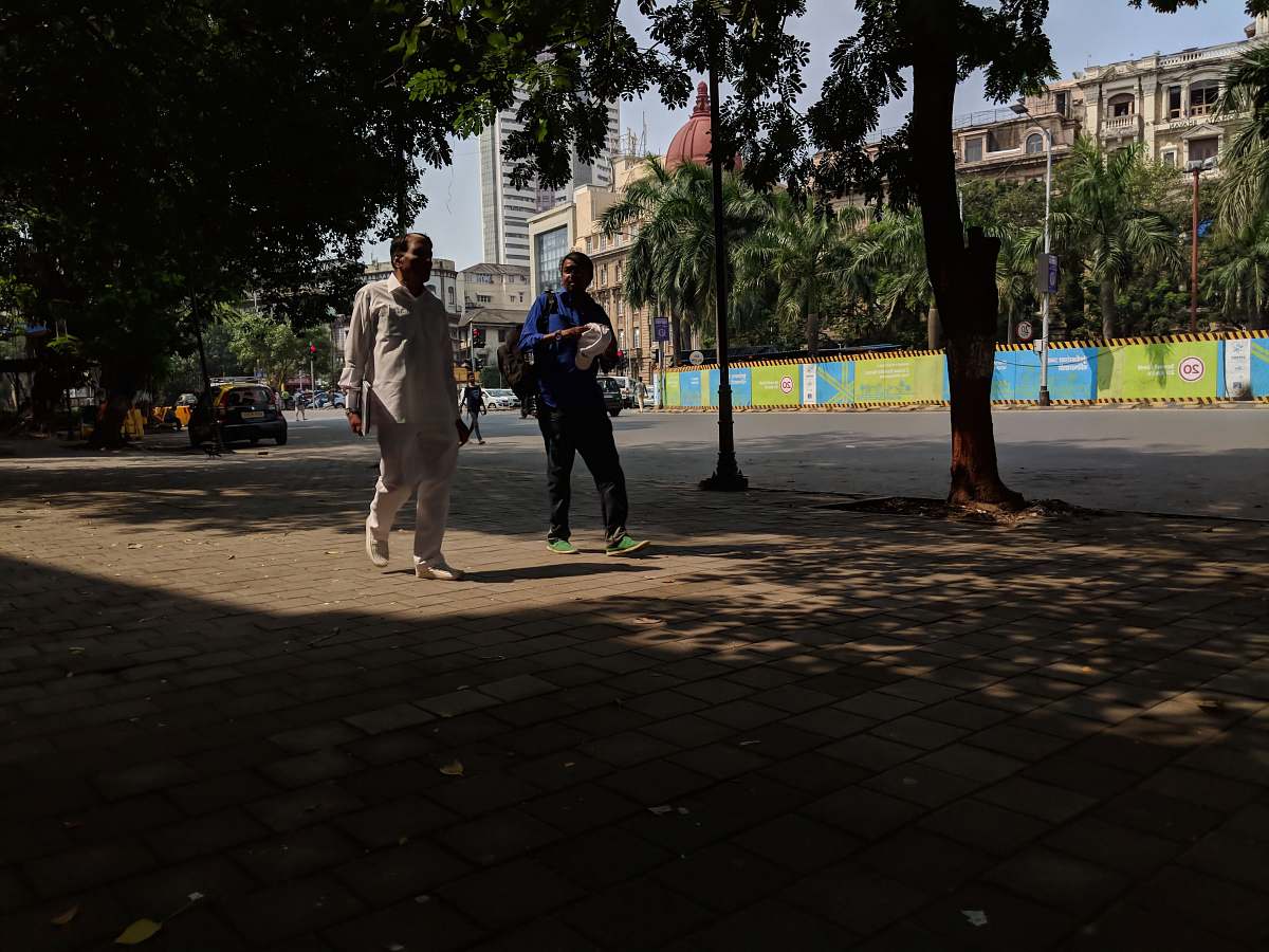 human two men walking at the park pedestrian