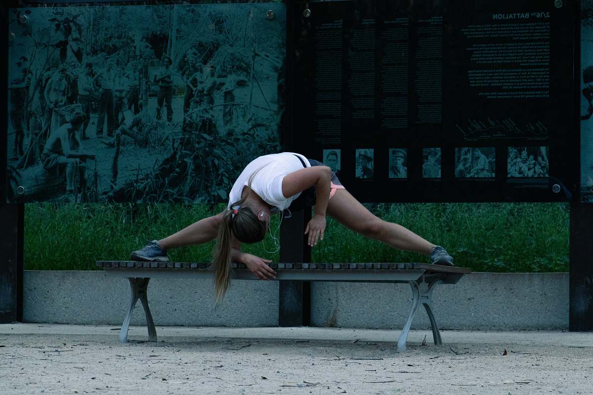 human woman exercising near poster furniture
