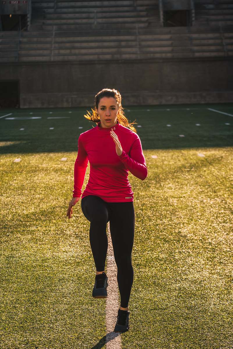 human woman exercising on field sport