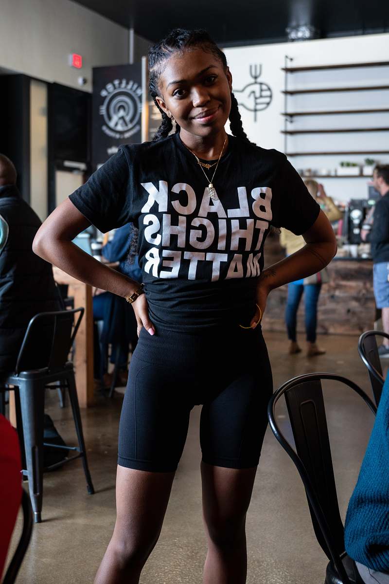 clothing woman in black crew-neck T-shirt apparel