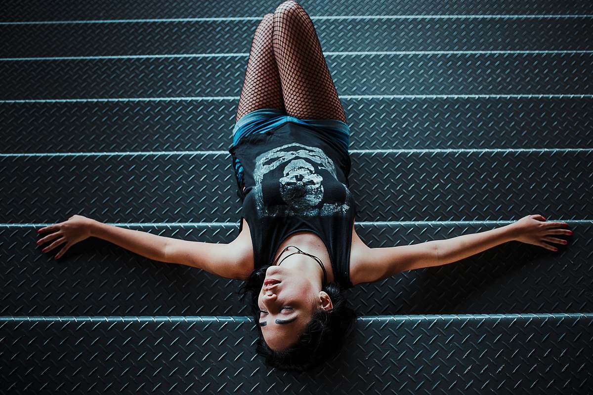 human woman lying on staircase people