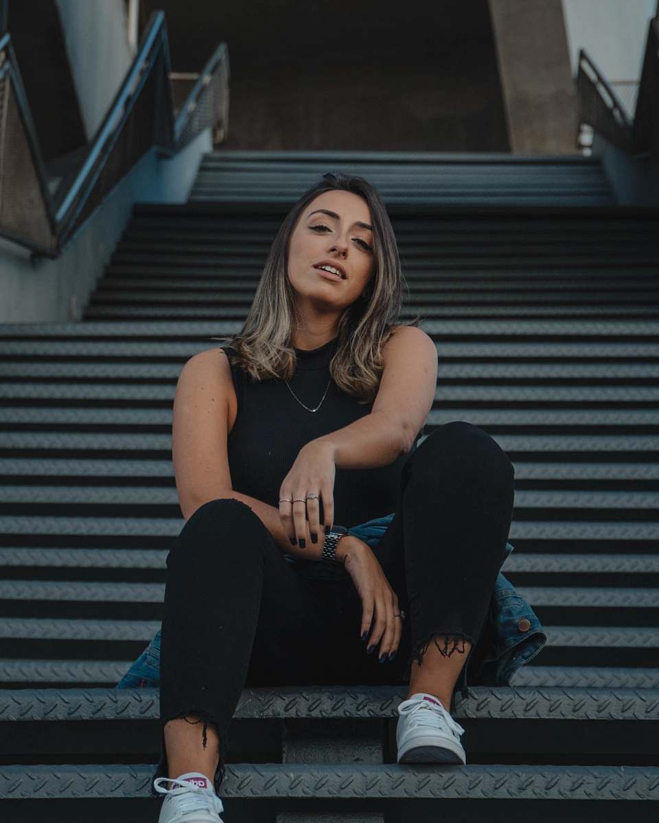 people woman sitting on stairs human
