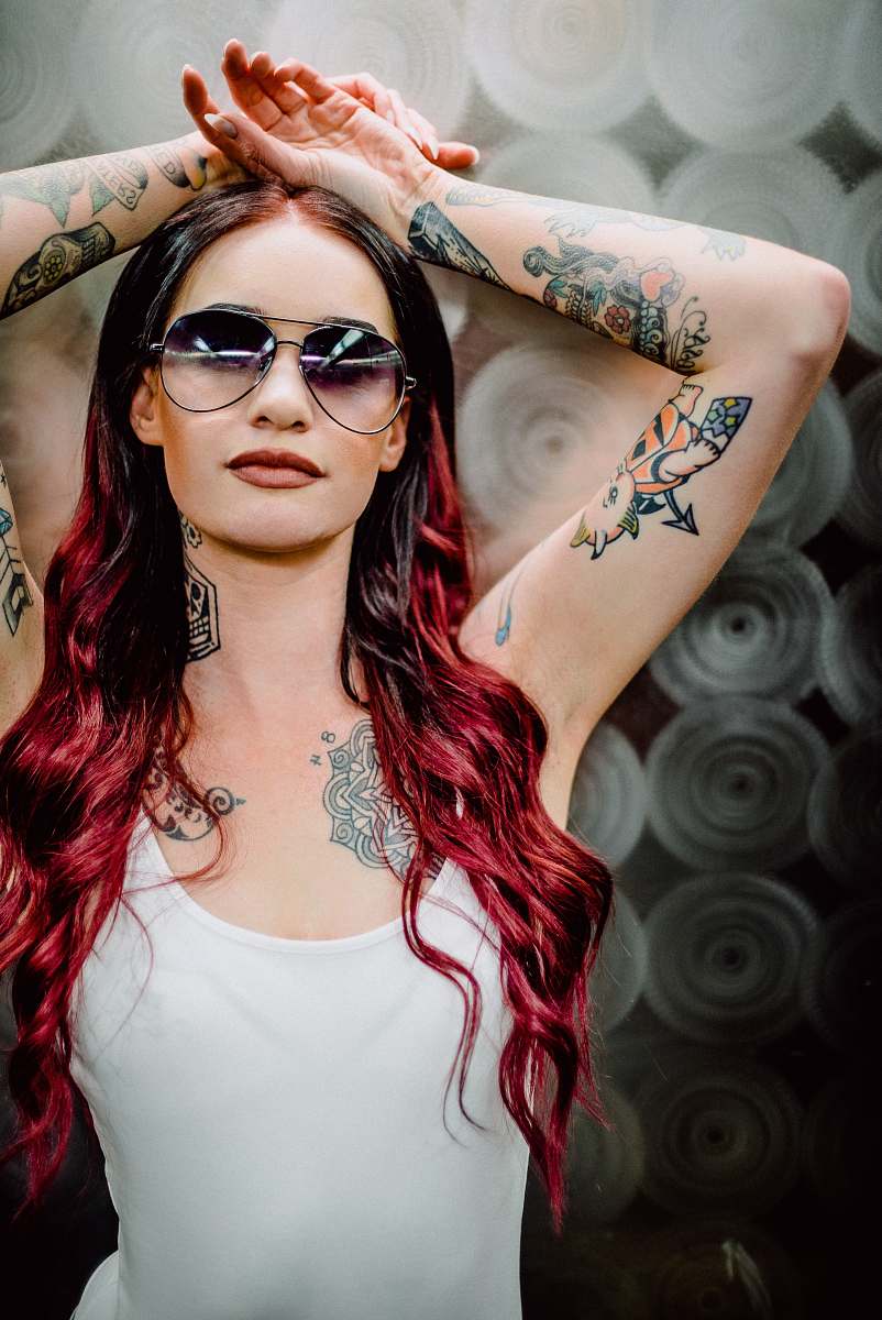 human woman wearing white spaghetti strap top skin