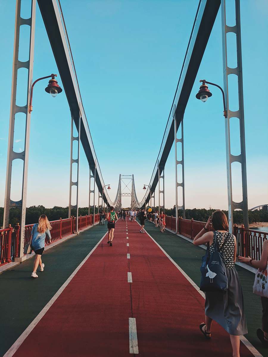human women walking on bridge pishokhidnyi mist