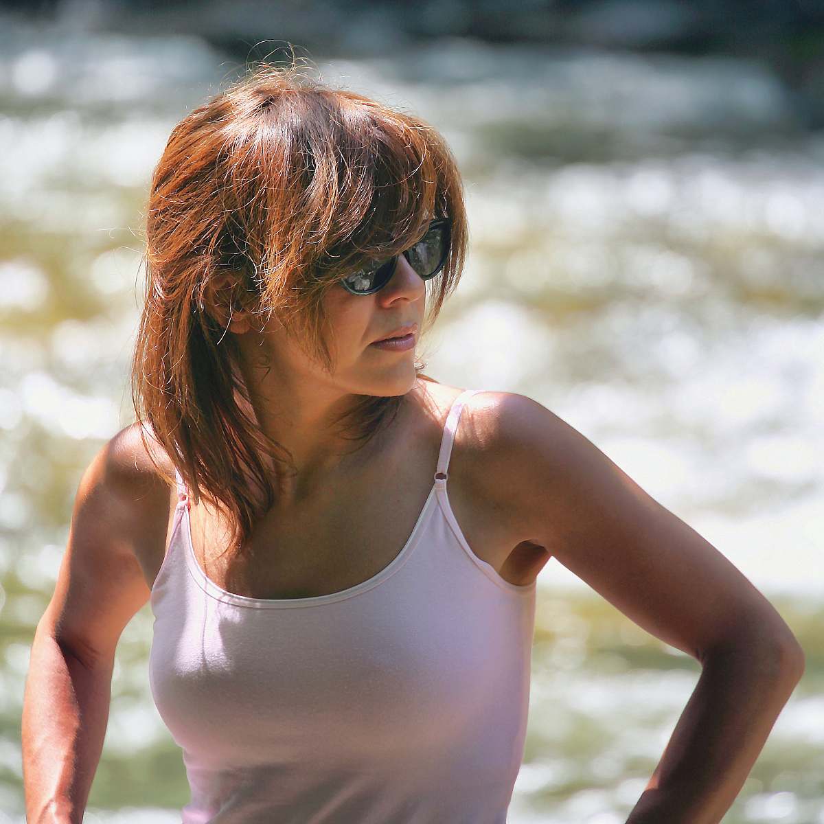 human women's pink spaghetti strap top close-up photography apparel