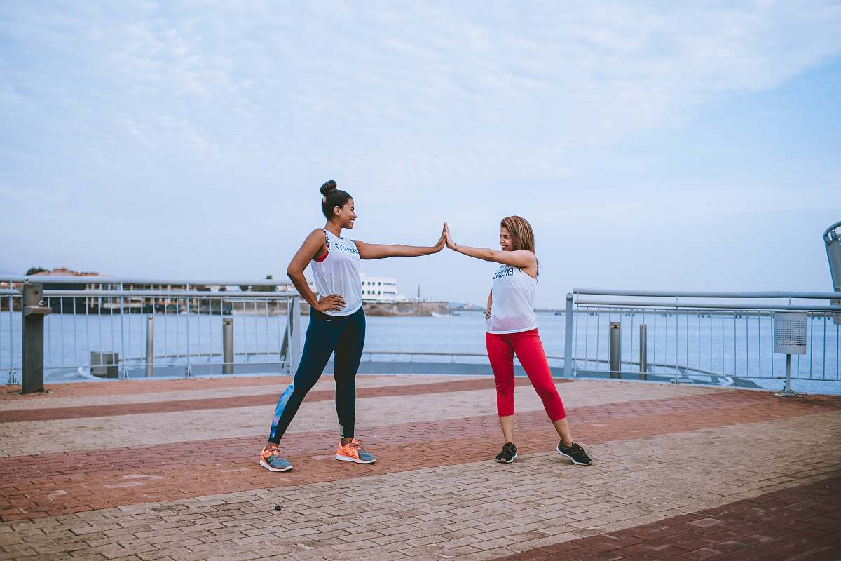 clothing two women's wearing track pants footwear