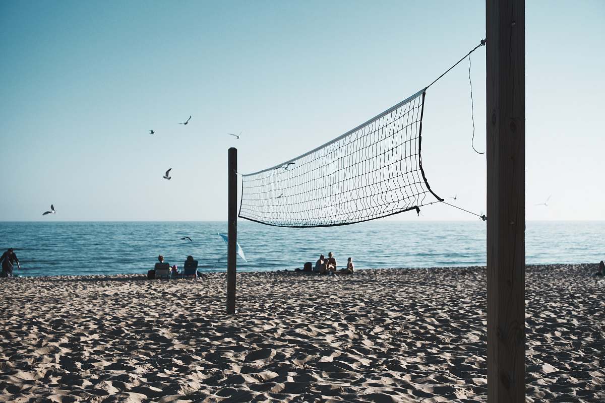 sea volleyball net on shore outdoors