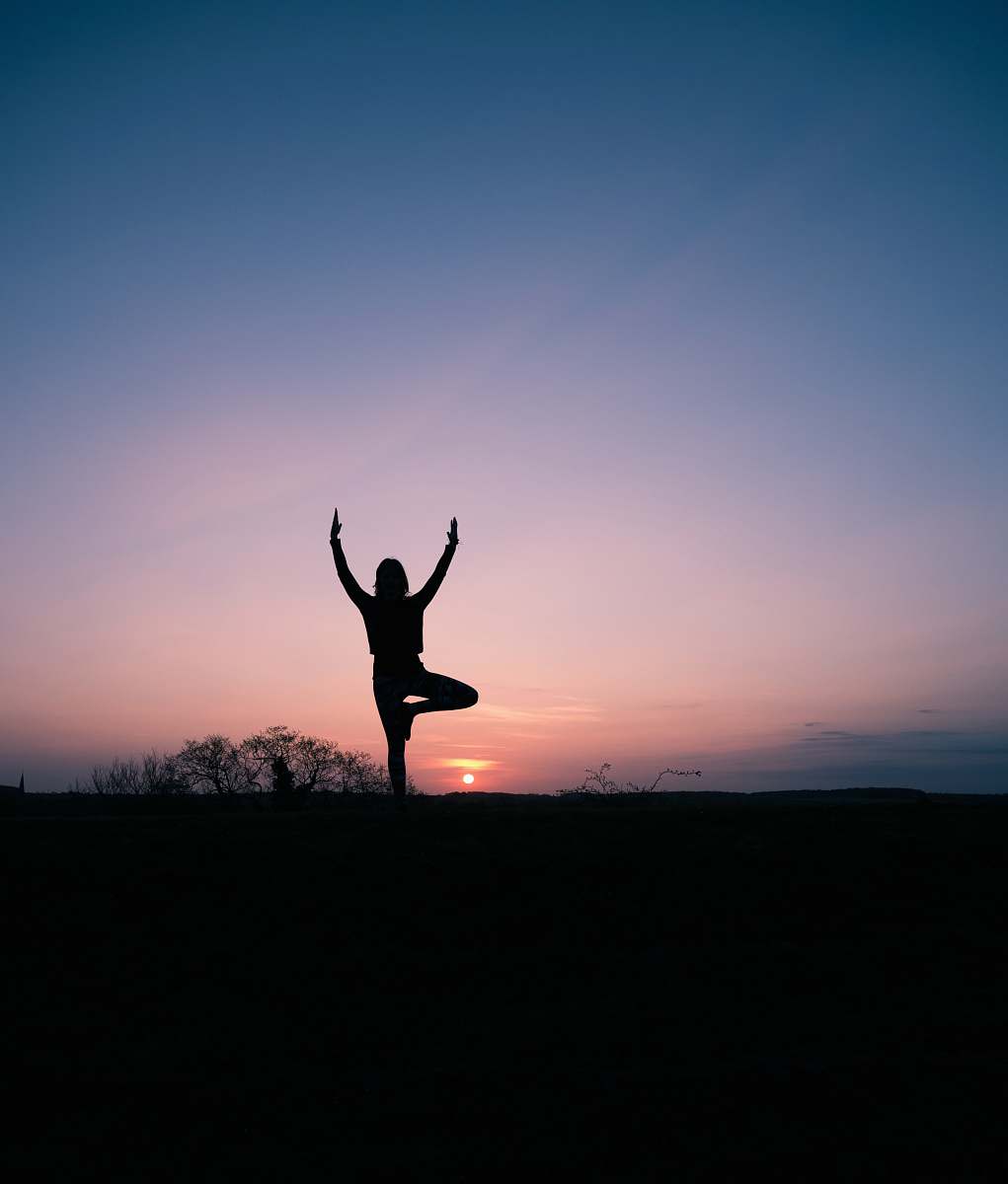 human silhouette of person balancing using 1 foot person