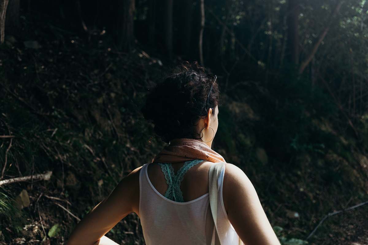 japan woman in white tank top working out
