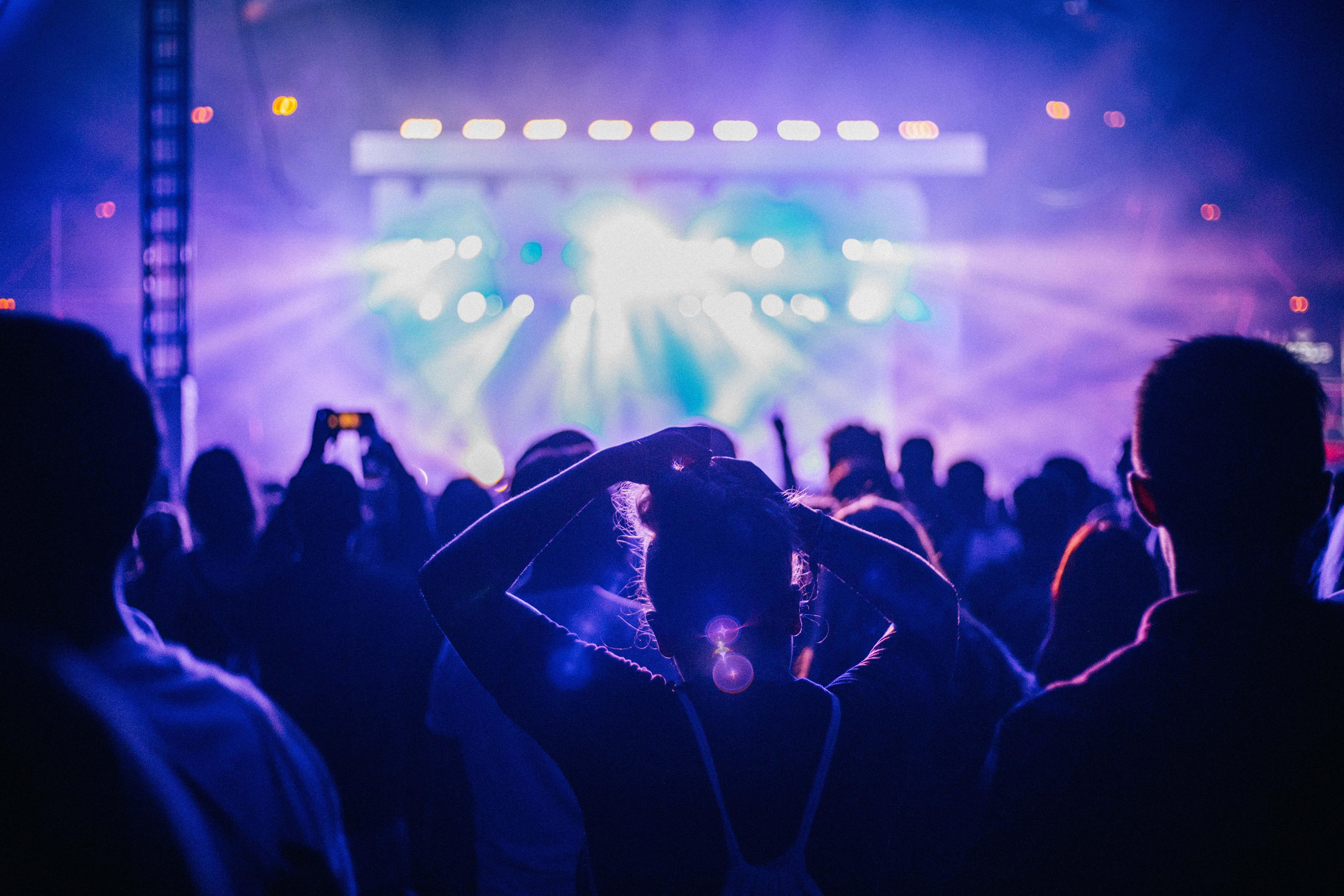 person people standing in front of stage with lights crowd Image - Free ...