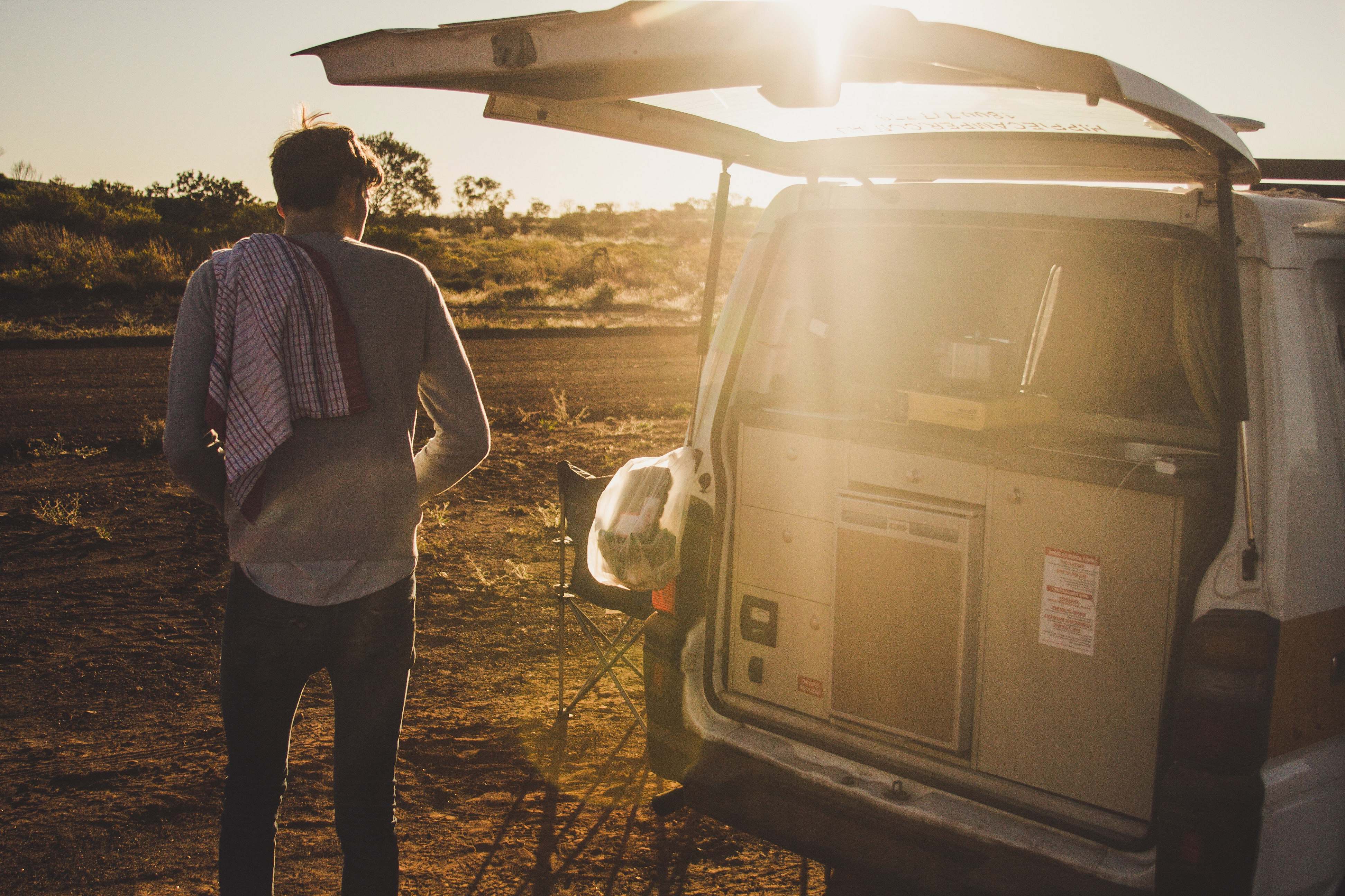 People Man Standing Near White Van During Daytime Person Image Free Photo