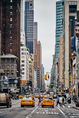 cab person crossing pedestrian lane car