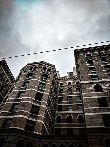 denver low-angle photography of brown concrete building architecture