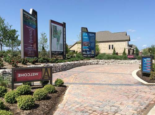 flagstone Welcome signage path