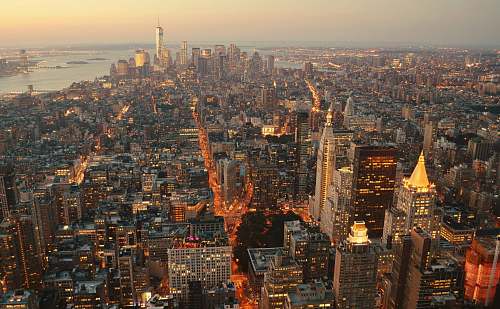 building aerial photography of skyscraper during golden hour urban