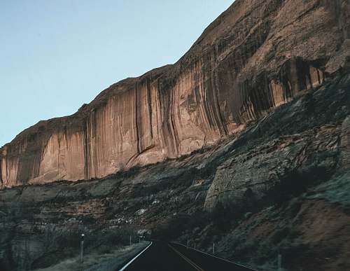 outdoors landscape photography of brown and gray mountain landslide