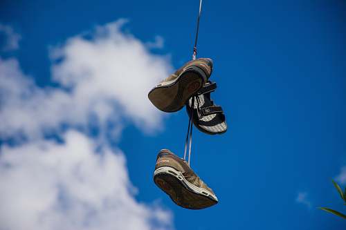 footwear pair of brown sneakers in bokeh photography shoe