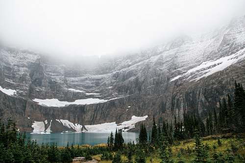 mountain landscape photo of lake near mountain snow