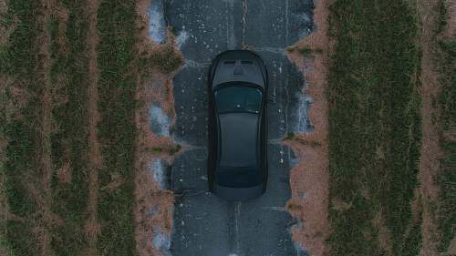 architecture black vehicle running on road bell tower