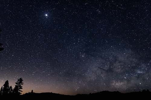 nature starts and moon during nighttime outdoors