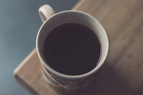 cup white and black ceramic mug coffee cup