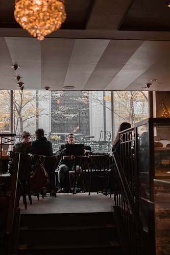 restaurant man sitting near the window cafe