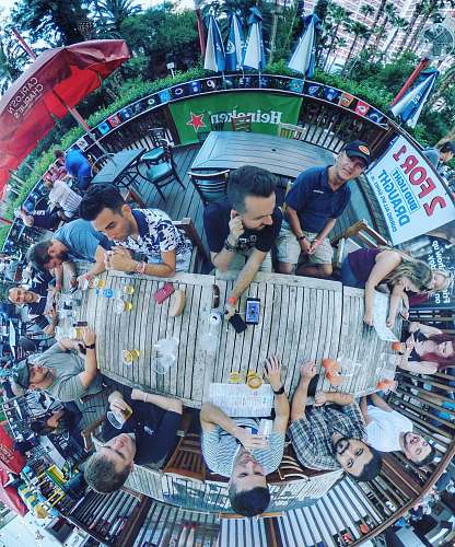 person people sitting near table amusement park